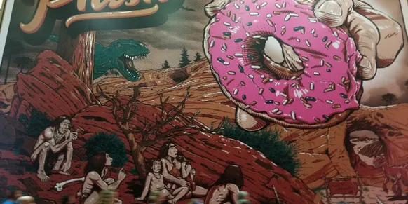 An art of a donut and some primitive people